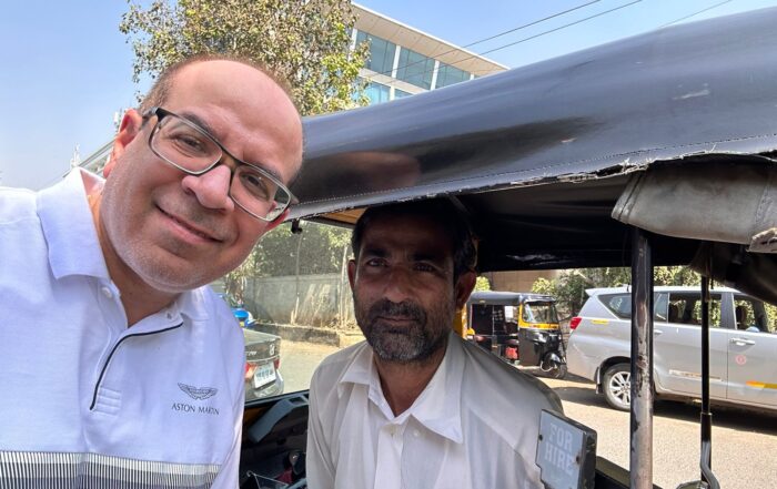 Nalin with Auto rickshaw driver